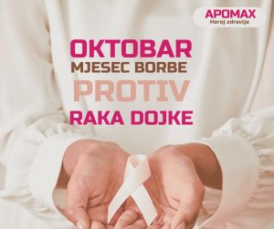 rak dojke - žena u bolničkoj opremi drži bijrluvrpcu, simbol borbe protiv raka dojke